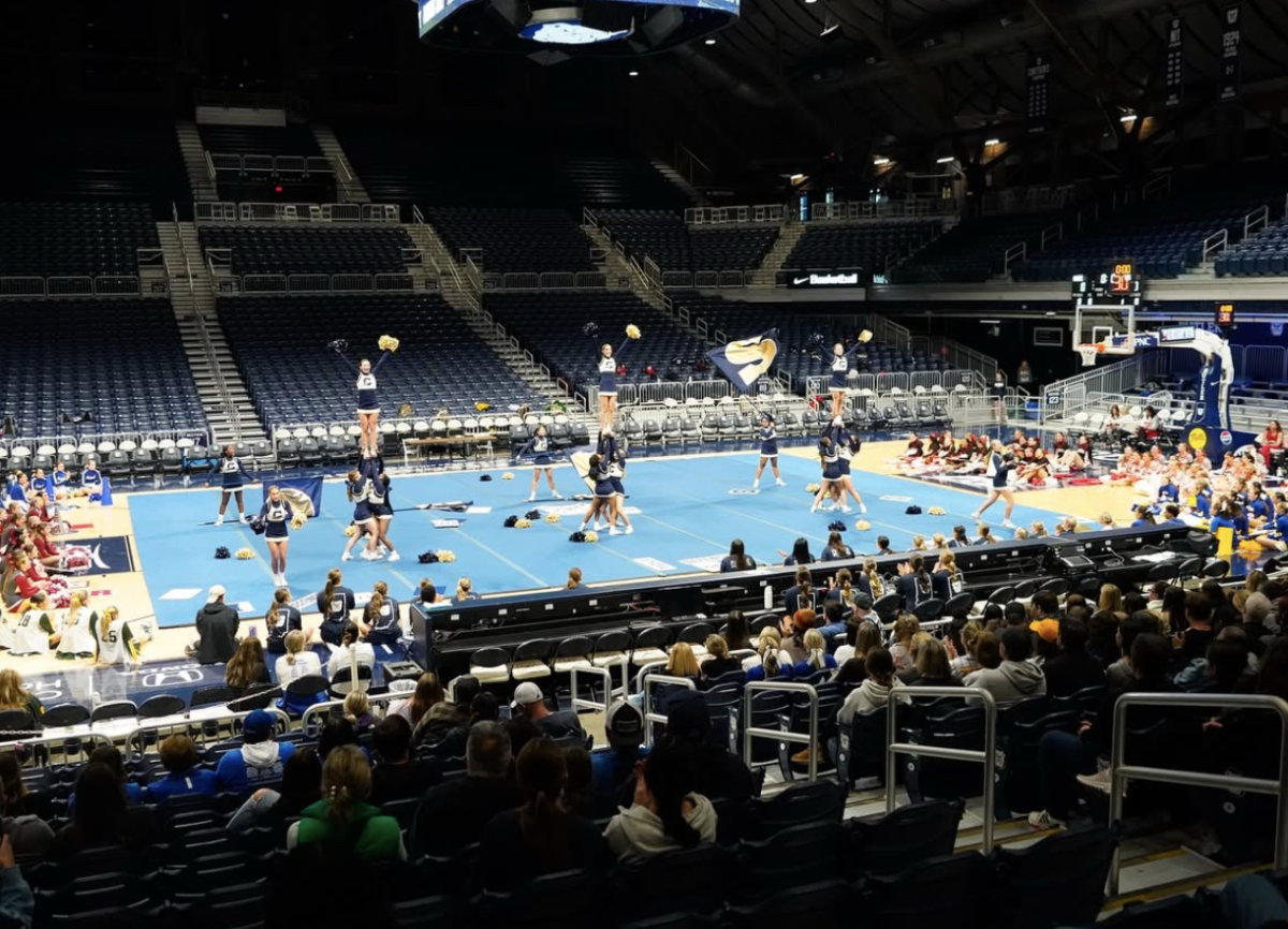 The Cathedral Irish cheer performing at the Hinkle Fieldhouse at Butler on Monday. The showcase was specifically held for teams to show the routine they will do at Nationals for anybody who wants to see the routine but won’t be able to go to Florida. Edwards says, “It was nice to see all the other performances from the other teams and to perform in front of my friends and family before leaving.”